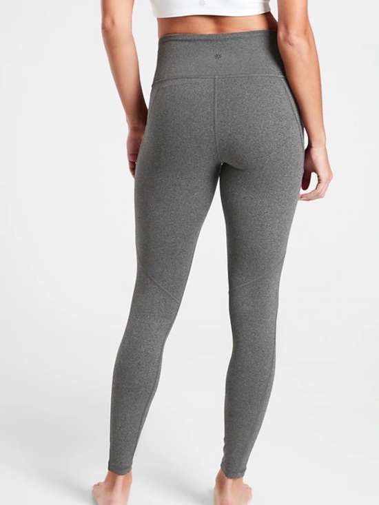 Athleta Pants - ATHLETA Stash Pocket Salutation Tight Leggings